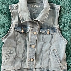 Distressed denim vest